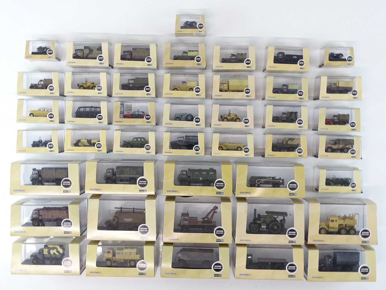 Lot 323 - A quantity of 1:76 Scale military cars, vans...