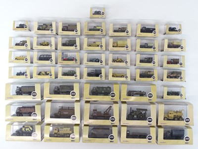 Lot 323 - A quantity of 1:76 Scale military cars, vans...