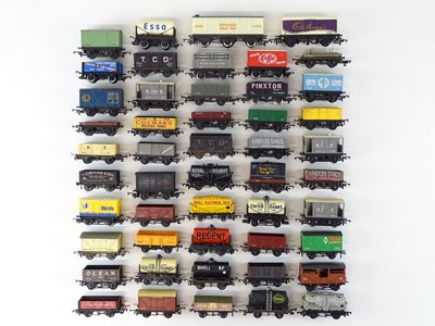 Lot 328 - A group of unboxed OO Gauge wagons by HORNBY...