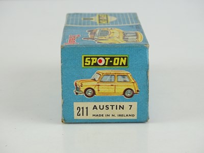 Lot 34 - A TRI-ANG SPOT-ON 211 Austin 7 Mini in dark...