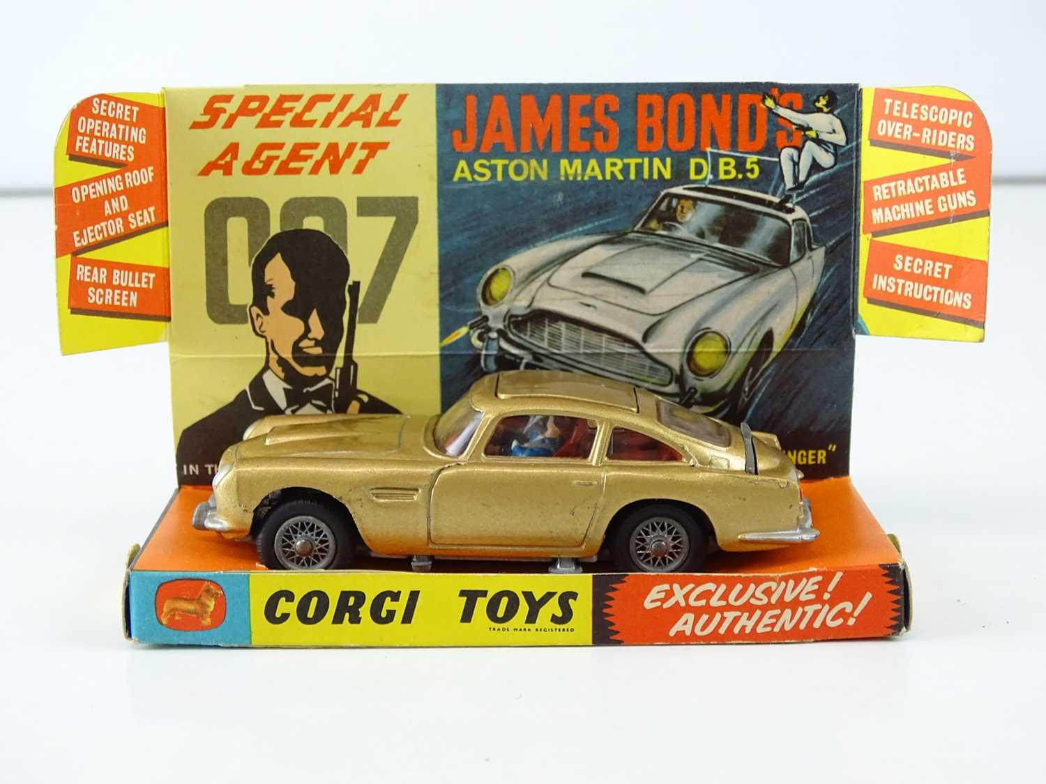Lot 37 - A CORGI 261 James Bond's Aston Martin in gold...