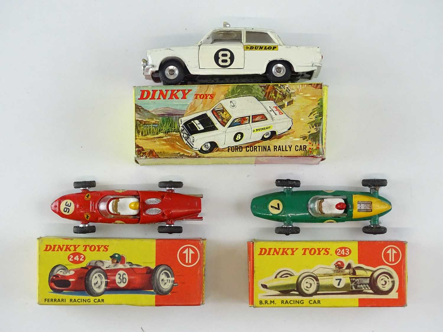 Lot 41 - A group of DINKY racing cars comprising a 212...