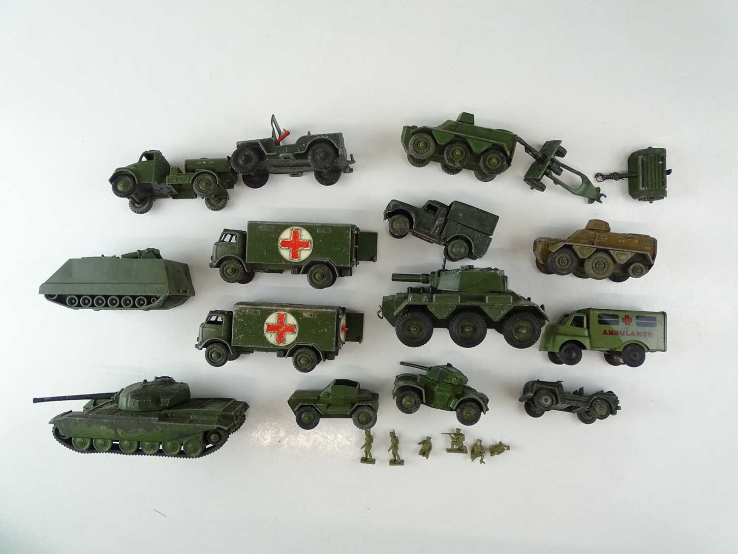 Lot 47 - A mixed group of playworn military vehicles...