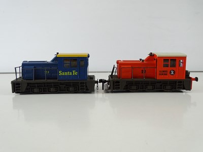Lot 561 - A pair of ATLAS O Gauge American outline 0-6-0...