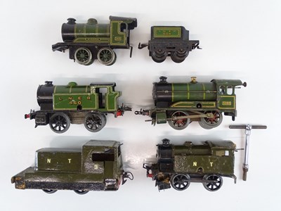 Lot 581 - A group of HORNBY O Gauge clockwork locos for...