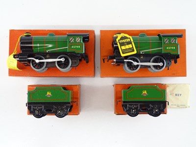 Lot 585 - A pair of HORNBY O Gauge No.30 clockwork steam...