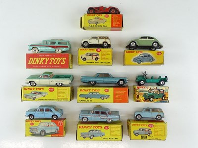 Lot 58 - A group of DINKY cars and vans as lotted - F/G...