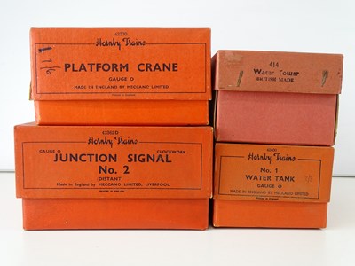 Lot 601 - A group of boxed HORNBY O Gauge accessories to...