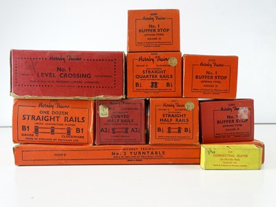 Lot 606 - A group of HORNBY O gauge boxed track and...