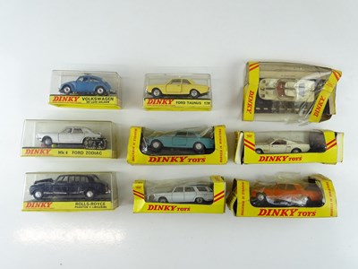 Lot 61 - A group of DINKY cars in later box styles as...