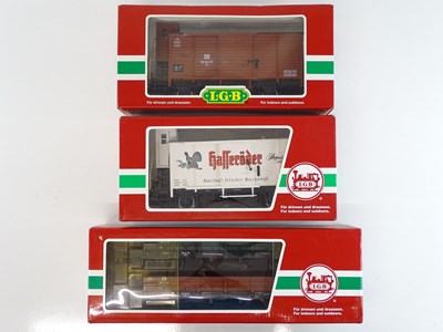 Lot 617 - A group of LGB G scale box vans and bogie flat...