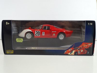 Lot 67 - A group of 1:18 scale diecast cars by RICKO -...