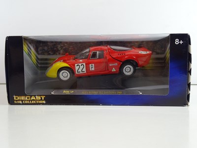 Lot 67 - A group of 1:18 scale diecast cars by RICKO -...