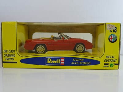 Lot 68 - A group of 1:18 scale diecast cars by REVELL,...