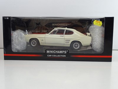 Lot 68 - A group of 1:18 scale diecast cars by REVELL,...