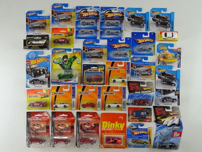 Lot 69 - A quantity of sealed and carded diecast cars...