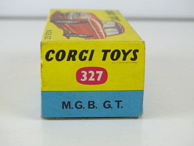 Lot 8 - A CORGI 327 MGB GT in dark red - VG in G/VG box