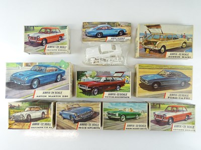 Lot 151A - A group of five unbuilt plastic car kits by...