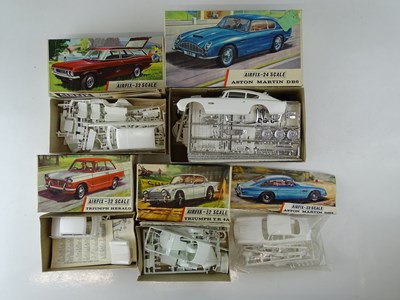 Lot 151 - A group of five unbuilt plastic car kits by...