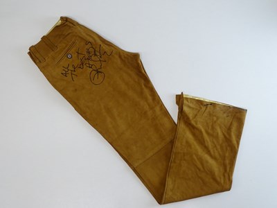 Lot 603 - A pair of Moleskin trousers signed by RICKY...