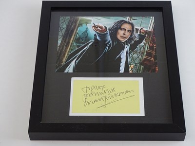 Lot 194 - HARRY POTTER: A framed and glazed ALAN RICKMAN...