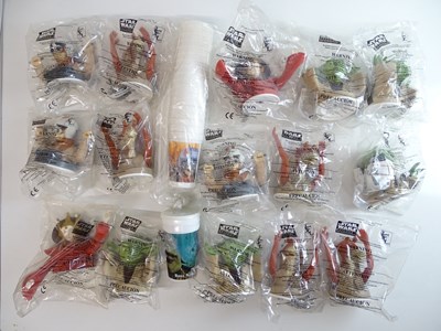 Lot 538 - STAR WARS: A full set of KFC cup toppers and...