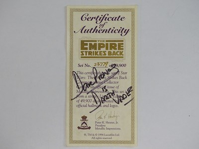 Lot 542 - STAR WARS: A pair of Metallic Impressions...