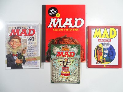 Lot 78 - A collection of MAD magazine hard and paper...