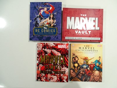 Lot 190 - A collection of four comic related books...
