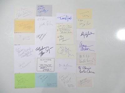Lot 81 - A group of signed pieces of card and paper -...