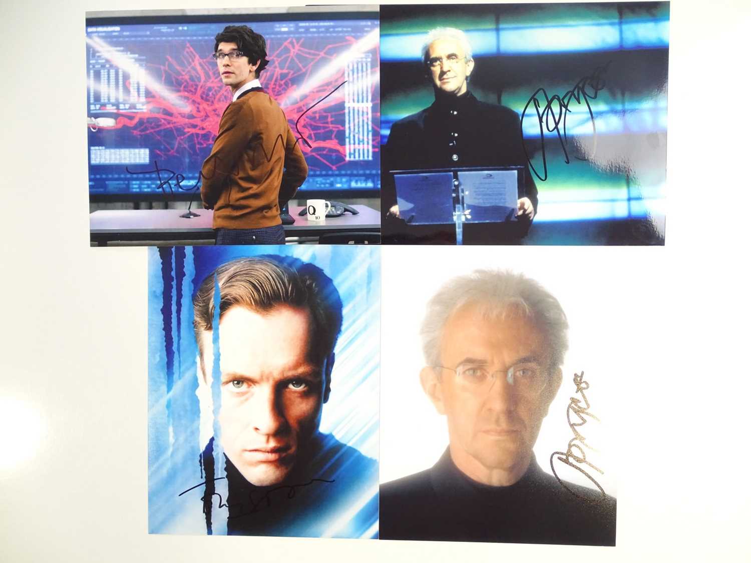 Lot 46 - JAMES BOND - a group of signed photos to...