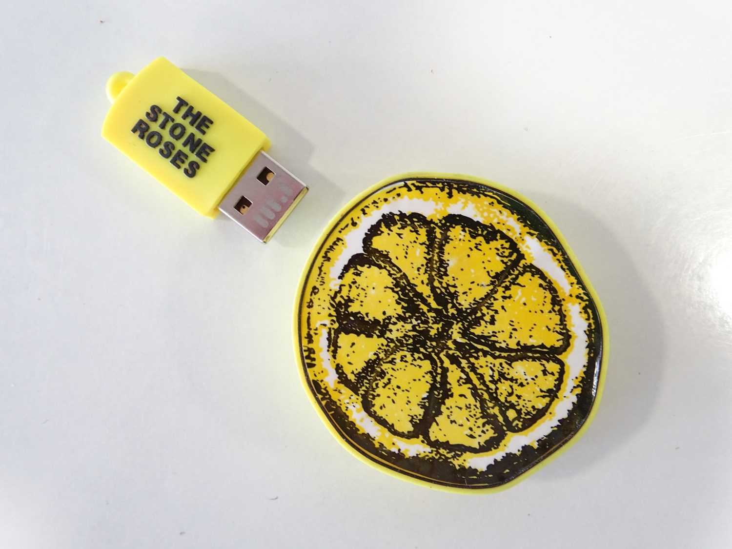 Lot 695 - THE STONE ROSES - rare lemon 20th anniversary...