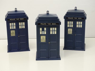 Lot 369 - DR WHO: A group of three Tardis shaped trading...