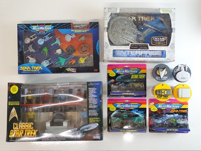 Lot 454 - A group of STAR TREK figures, vehicles etc by...