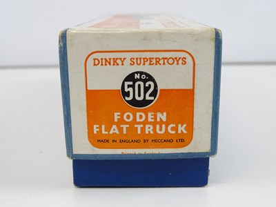 Lot 12 - A DINKY 502 Foden Flat Truck, 1st style cab in...