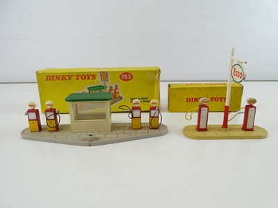 Lot 122 - A pair of DINKY Petrol Stations comprising a...