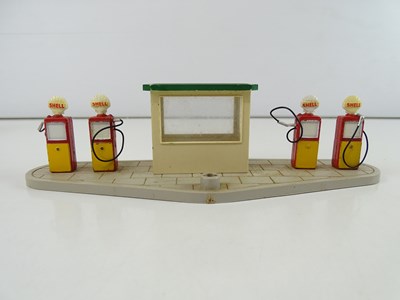 Lot 122 - A pair of DINKY Petrol Stations comprising a...