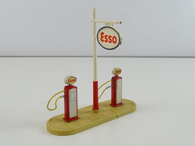 Lot 122 - A pair of DINKY Petrol Stations comprising a...