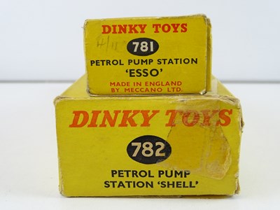 Lot 122 - A pair of DINKY Petrol Stations comprising a...