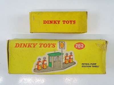 Lot 122 - A pair of DINKY Petrol Stations comprising a...