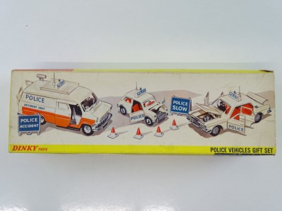 Lot 127 - A DINKY 297 Police Vehicles Gift Set, appears...