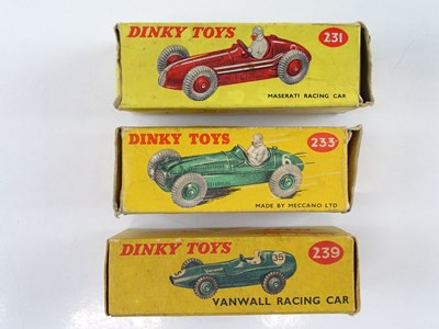 Lot 157 - A trio of DINKY racing cars comprising a 231...