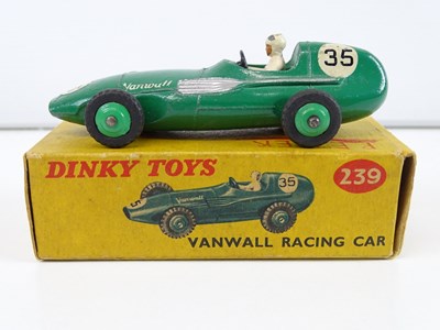 Lot 157 - A trio of DINKY racing cars comprising a 231...