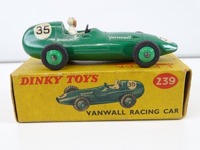Lot 157 - A trio of DINKY racing cars comprising a 231...