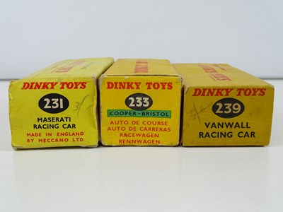 Lot 157 - A trio of DINKY racing cars comprising a 231...