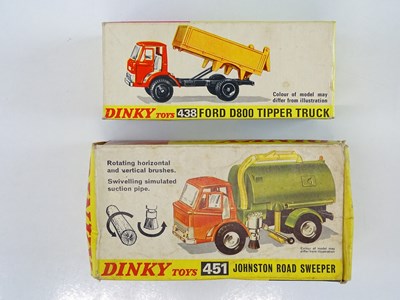 Lot 158 - A pair of DINKY Ford trucks comprising a 438...