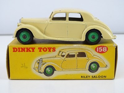 Lot 182 - A DINKY 158 Riley saloon in cream with green...