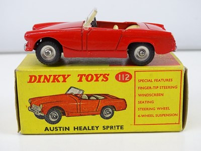 Lot 183 - A DINKY 112 Austin Healey Sprite in red with...