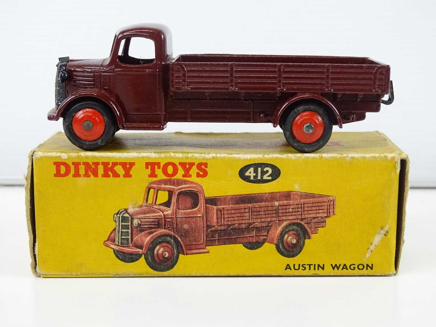 Lot 184 - A DINKY 412 Austin Wagon in maroon with red...