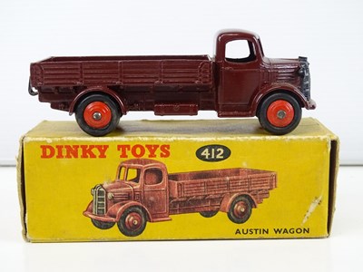 Lot 184 - A DINKY 412 Austin Wagon in maroon with red...